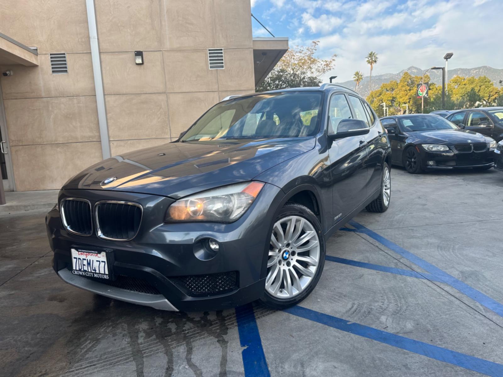 2014 Gray /black BMW X1 leather (WBAVM1C58EV) with an 4 CYLINDER engine, Automatic transmission, located at 30 S. Berkeley Avenue, Pasadena, CA, 91107, (626) 248-7567, 34.145447, -118.109398 - Photo #1